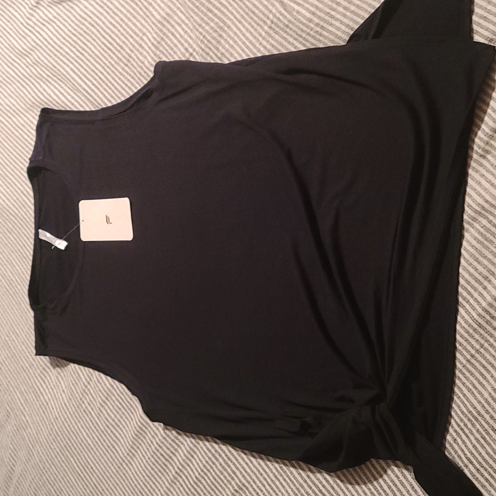 New with tags Fabletics black Alia Tied Tank. Smoke free and pet free home.
